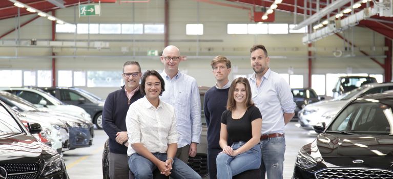 Founder team of Carvolution in Bannwil warehouse