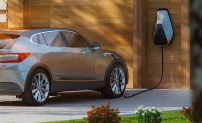 Electric auto charging in front of a residential house
